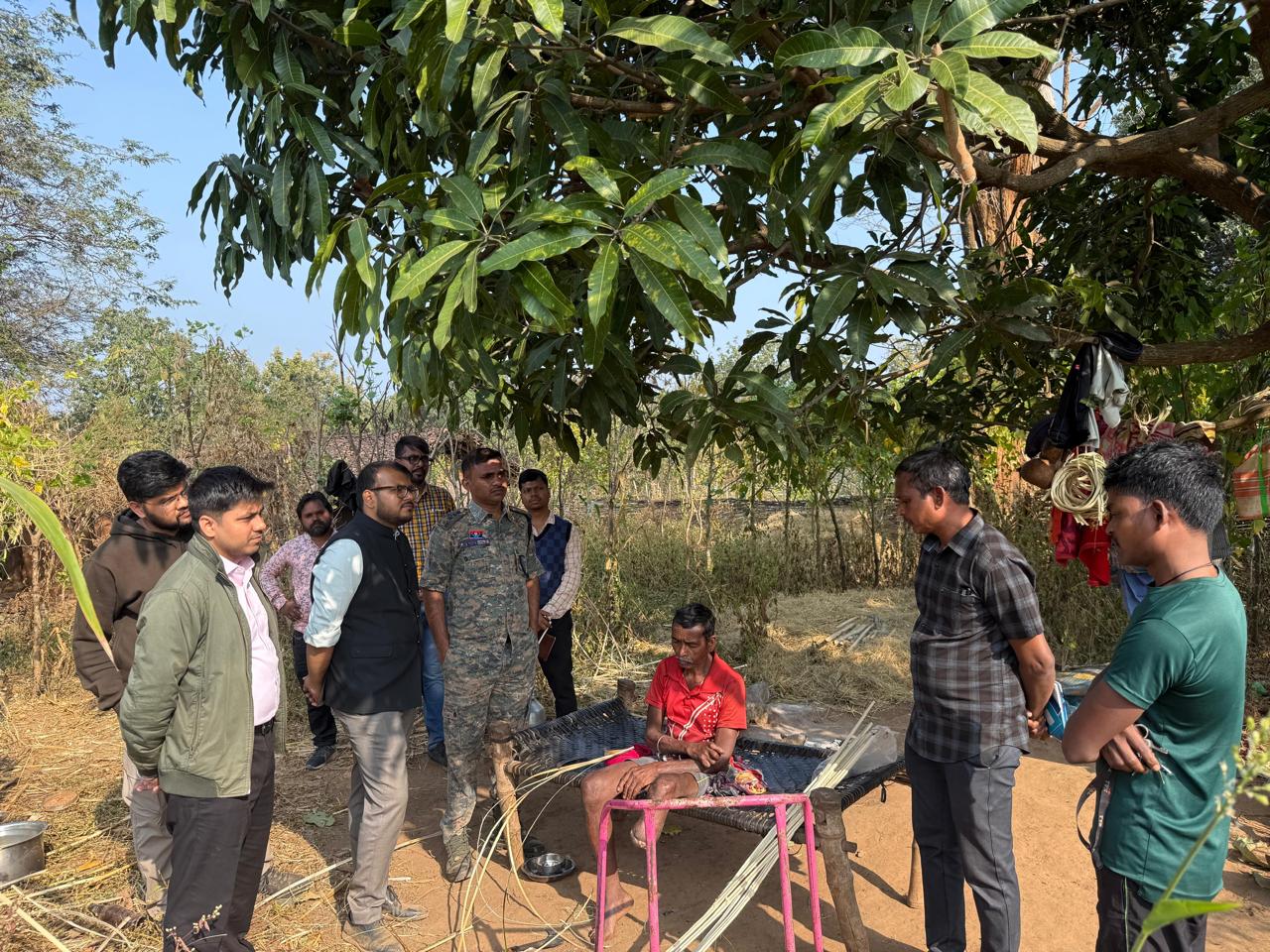 Administrative officer discussing with villagers