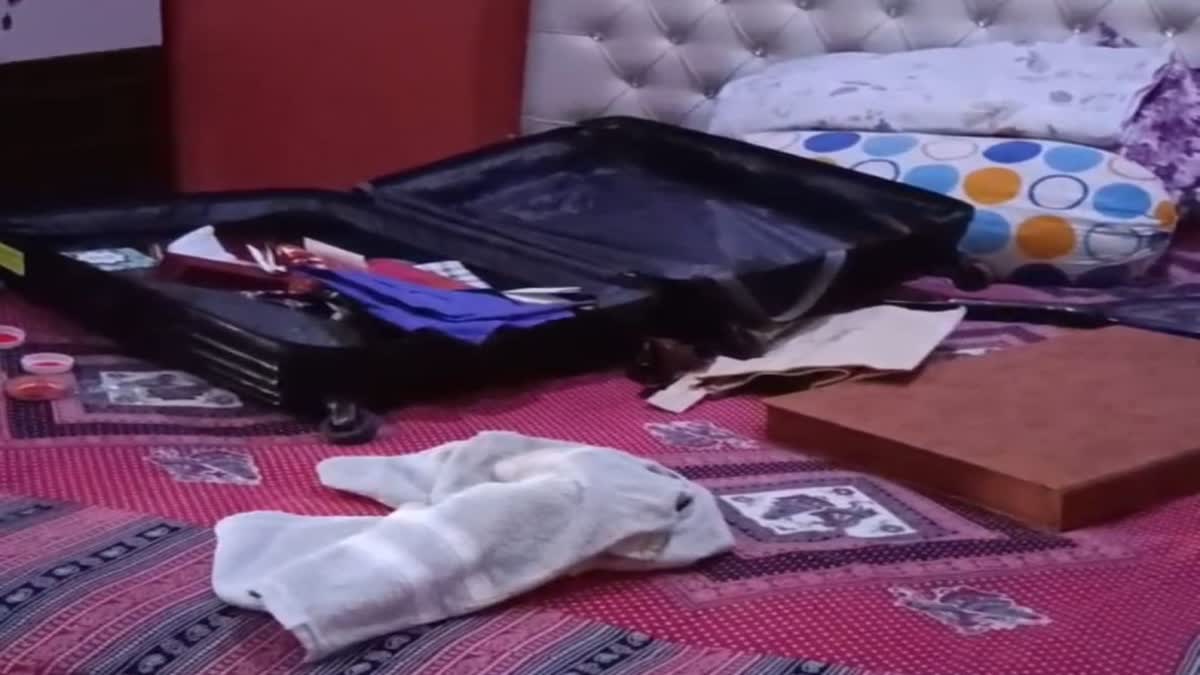 ONE SIDE SON'S MURDER, ON THE OTHER SIDE, SHOCK OF THEFT