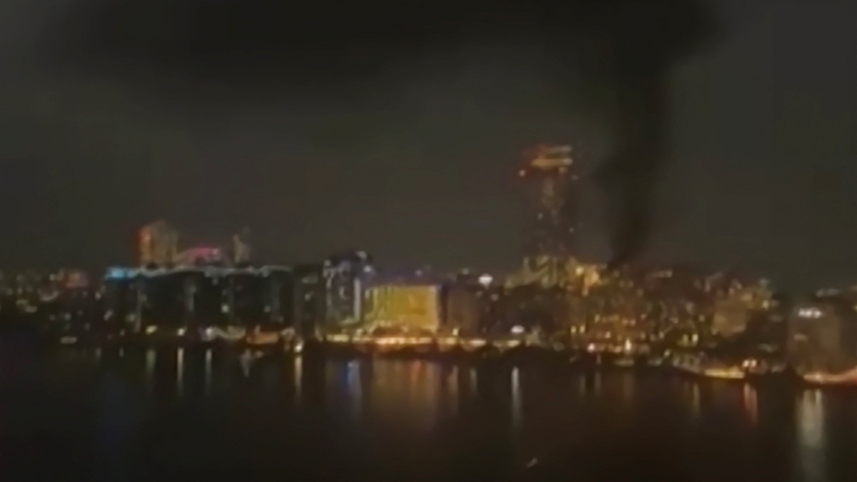 This video grab taken from UGC images posted on social media on February 28, 2026, shows smoke rising above Dubai, as Iran carried out retaliatory strikes in the Gulf following US and Israeli attacks.