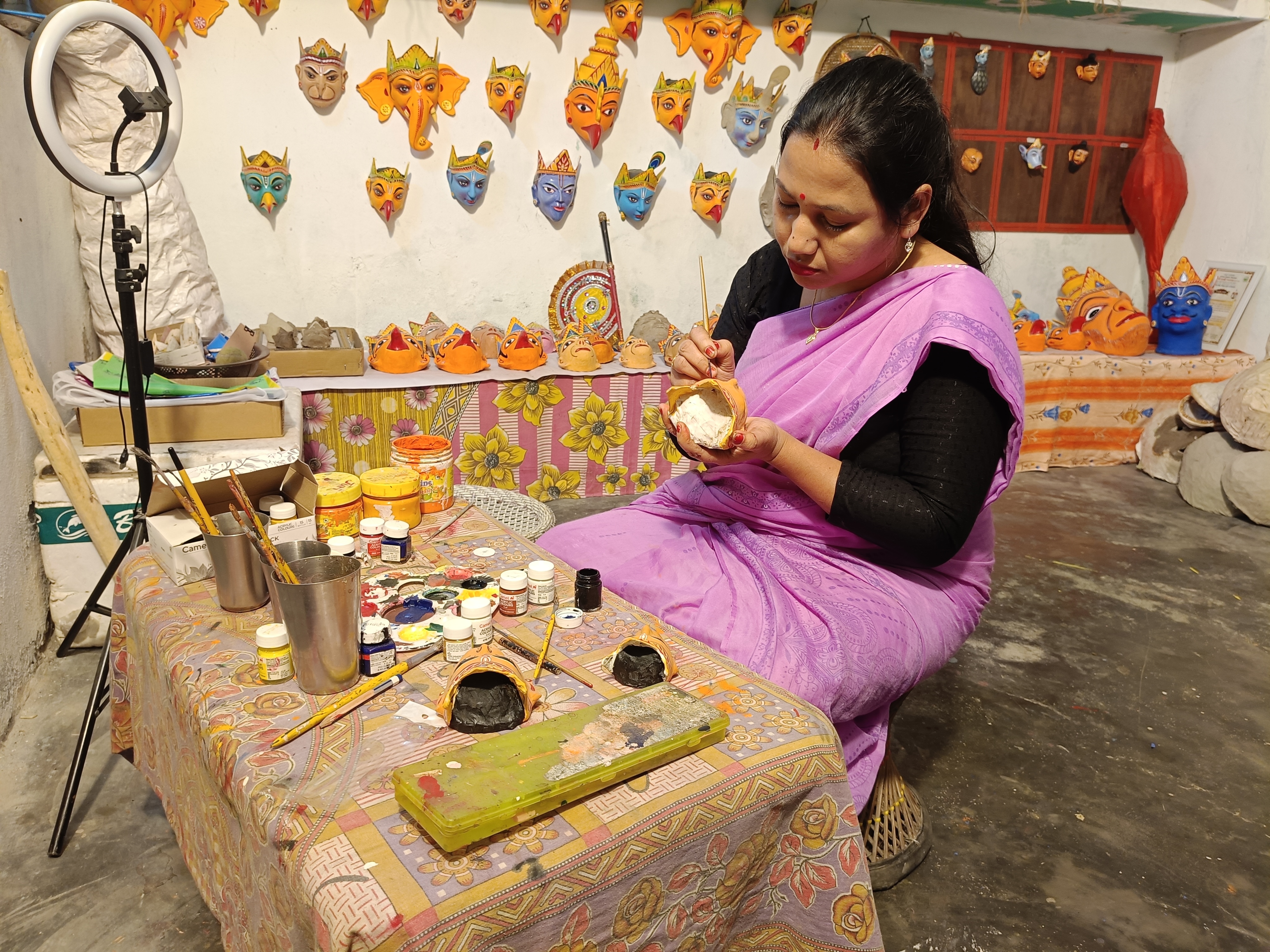 Juri Moni Kalita from Bengenaati Satra in Majuli achieved self-reliance by mask-making