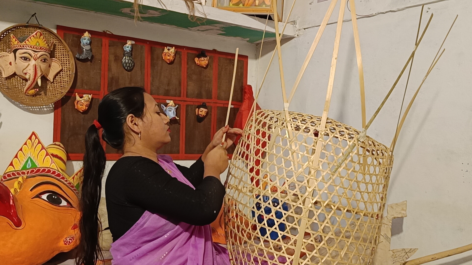 Juri Moni Kalita from Bengenaati Satra in Majuli achieved self-reliance by mask-making