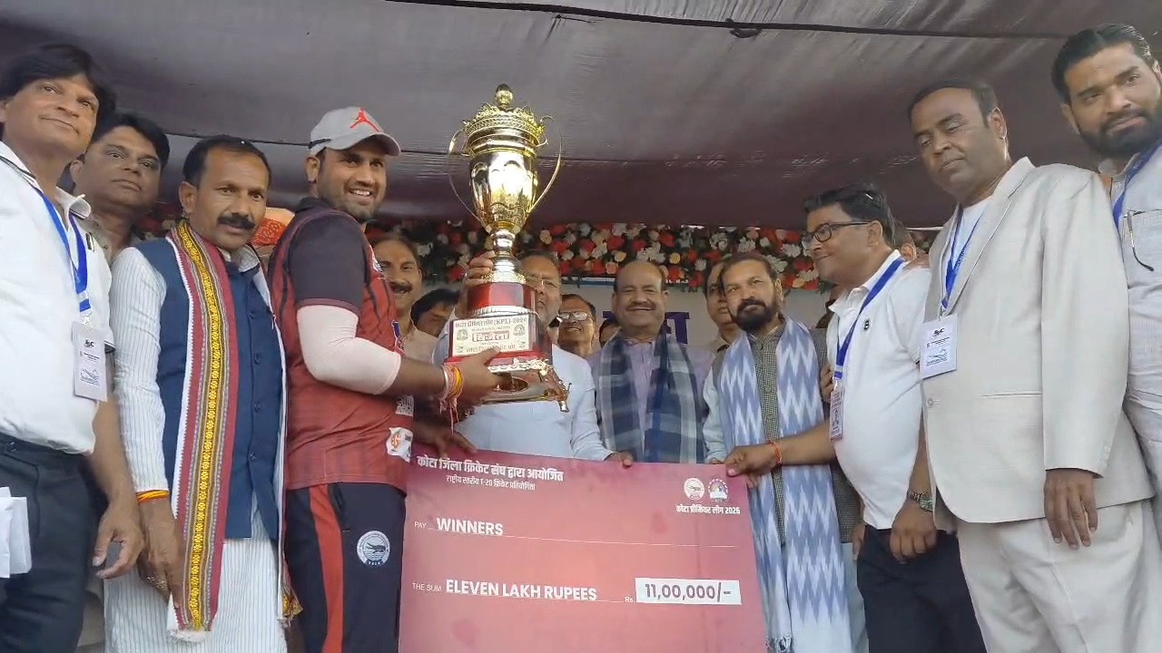 winning team presented with a trophy