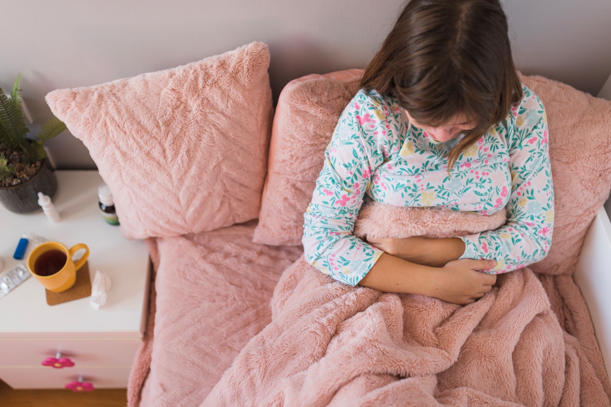 Young girl resting during her periods