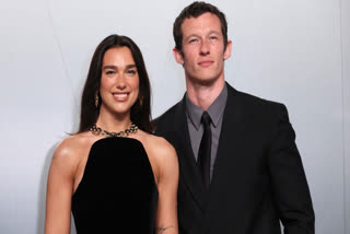 Dua Lipa and Callum Turner
