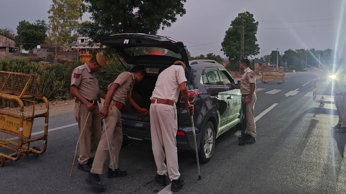 Police taking action against traffic rule violators.