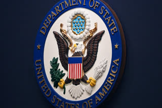 FILE - The State Department seal is seen on the briefing room lectern at the State Department in Washington, Jan. 31, 2022.