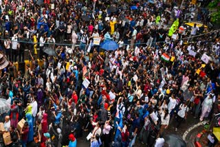 Supporters of the Cockroach Janta Party (CJP) participate in a protest against Union Education Minister Dharmendra Pradhan over alleged examination irregularities at Shivaji Park in Mumbai, Maharashtra