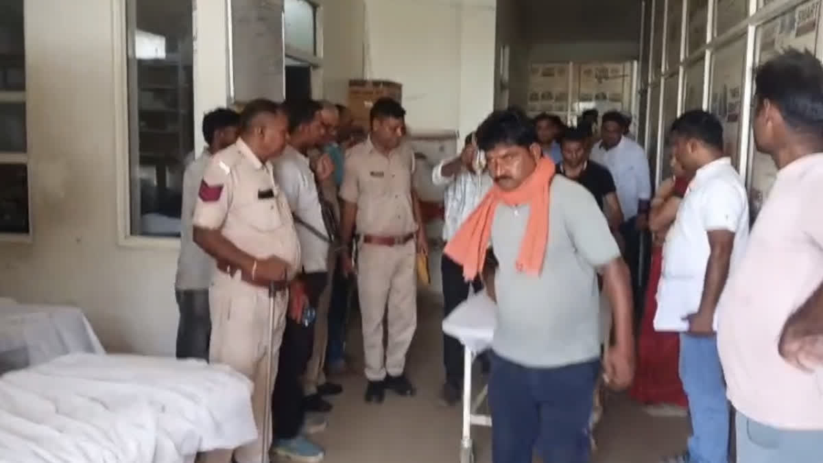 Police bringing injured person to hospital