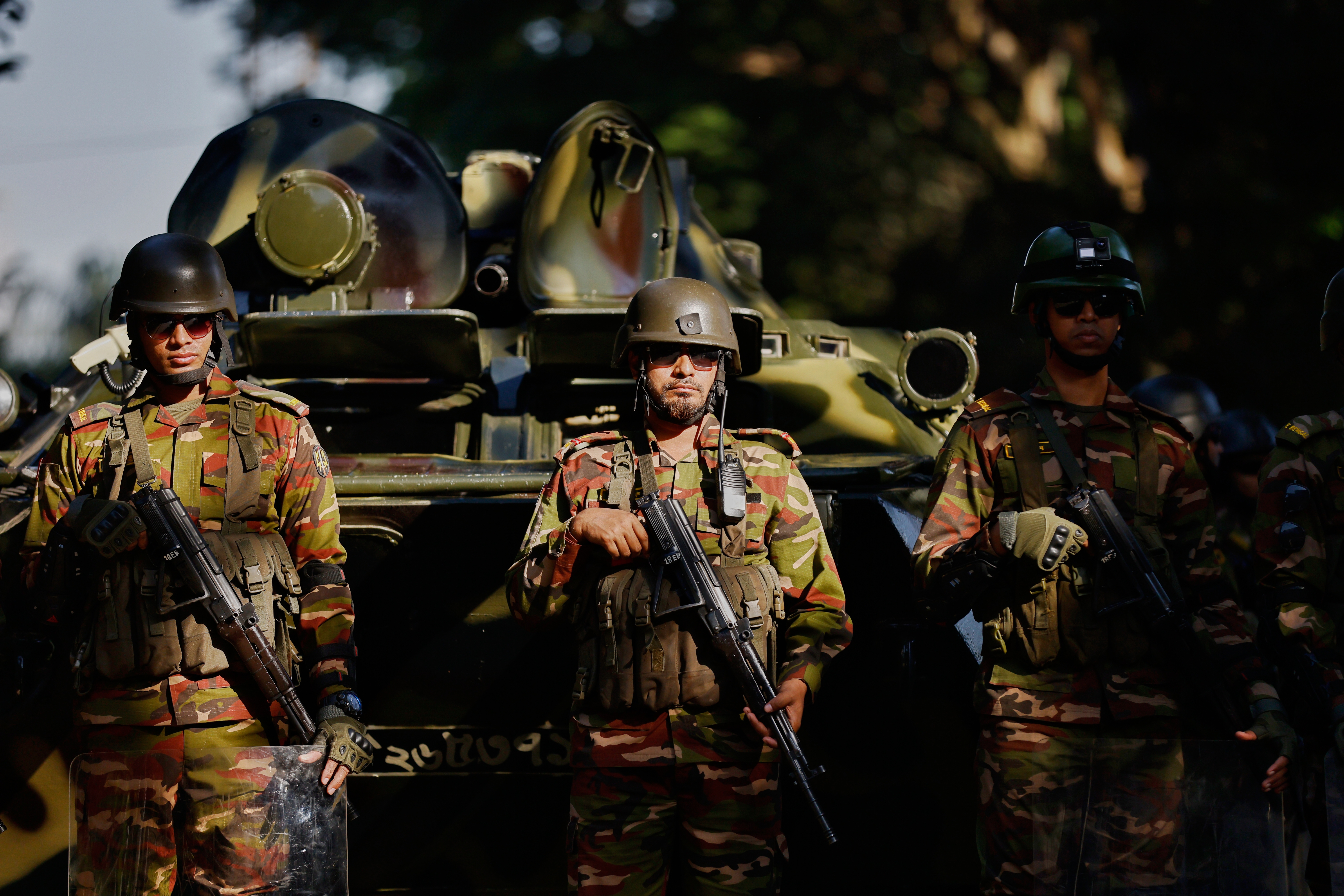 Bangladeshi Army soldiers stand guard outside International Crimes Tribunal after security has been beefed up across the country ahead of an expected verdict against ousted Prime Minister Sheikh Hasina, in Dhaka, Bangladesh, Monday, Nov. 17, 2025
