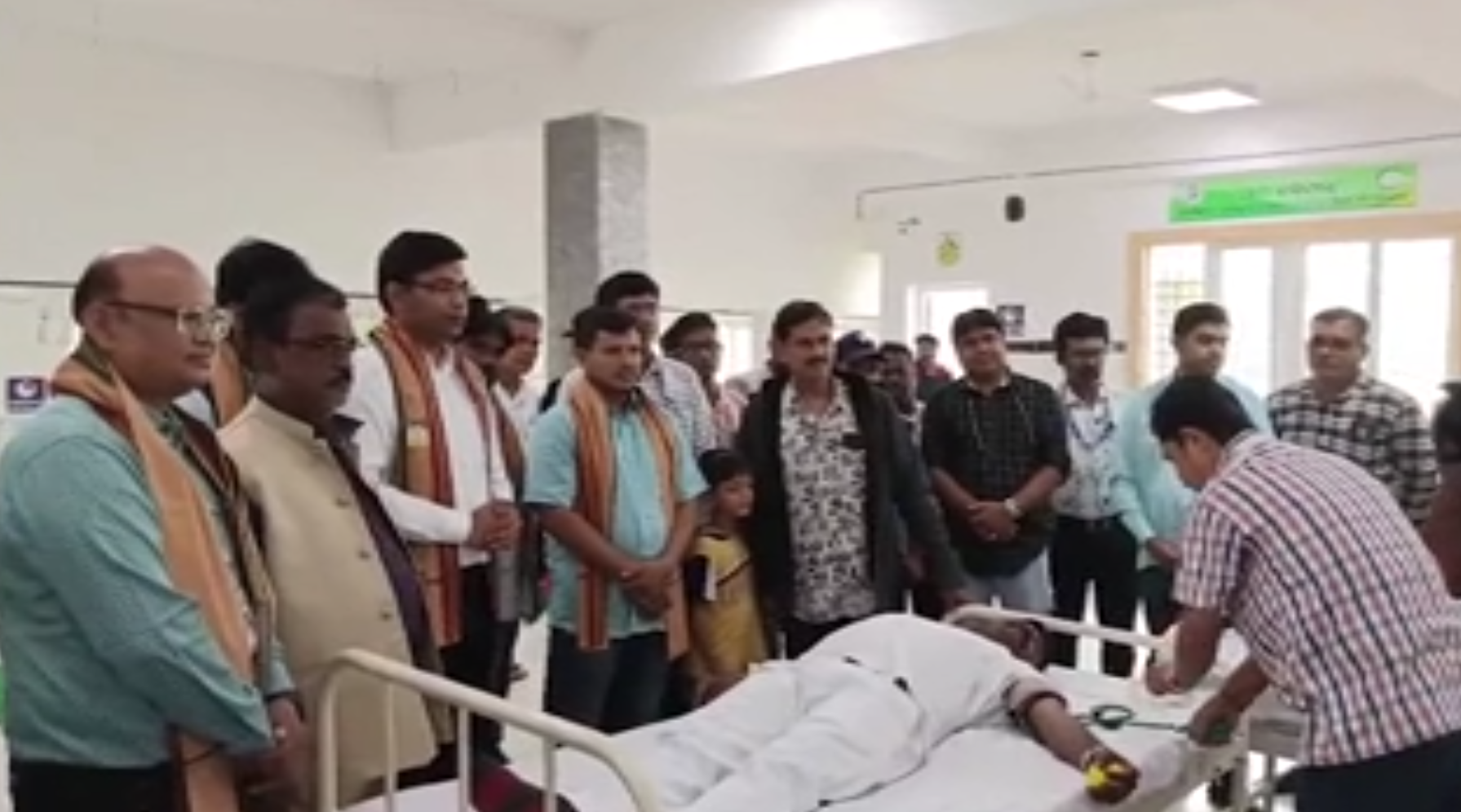 Media representatives organize a blood donation camp