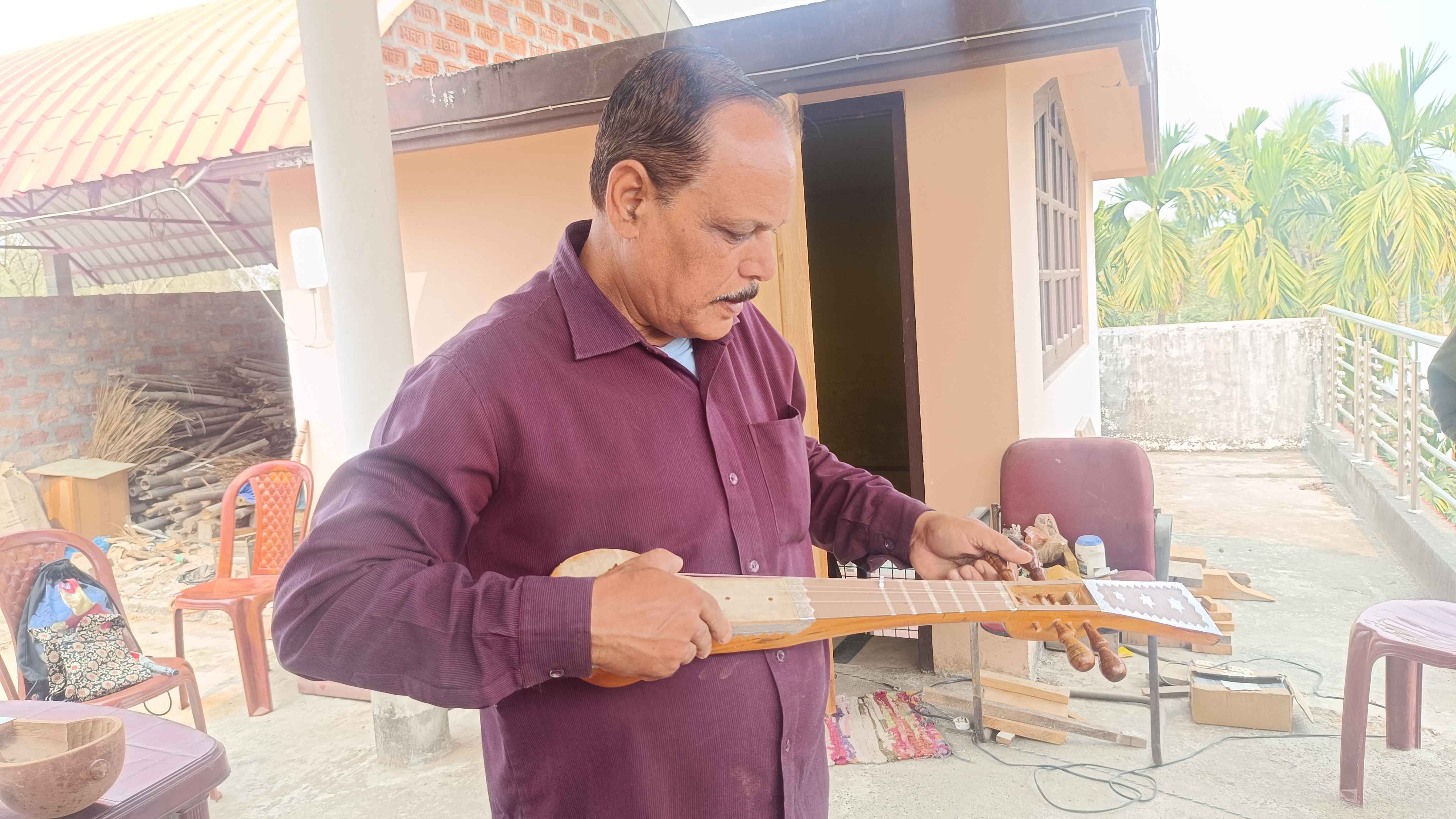 Bhupendra Nath Das has created many folk instruments at Sundaridiyar in Barpeta
