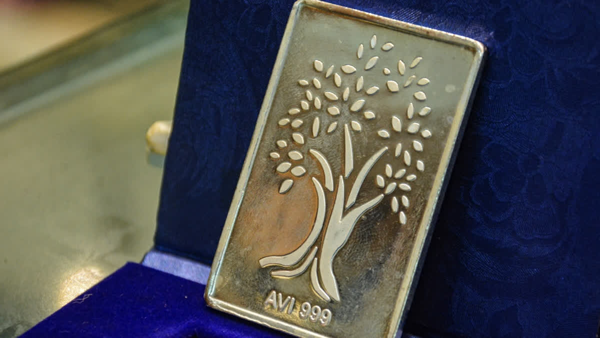 A silver bar is displayed at a bullion shop as silver prices hit a record high, crossing Rs 4.10 lakh per kilogram, in Thane, Maharashtra, Thursday, Jan. 29, 2026.