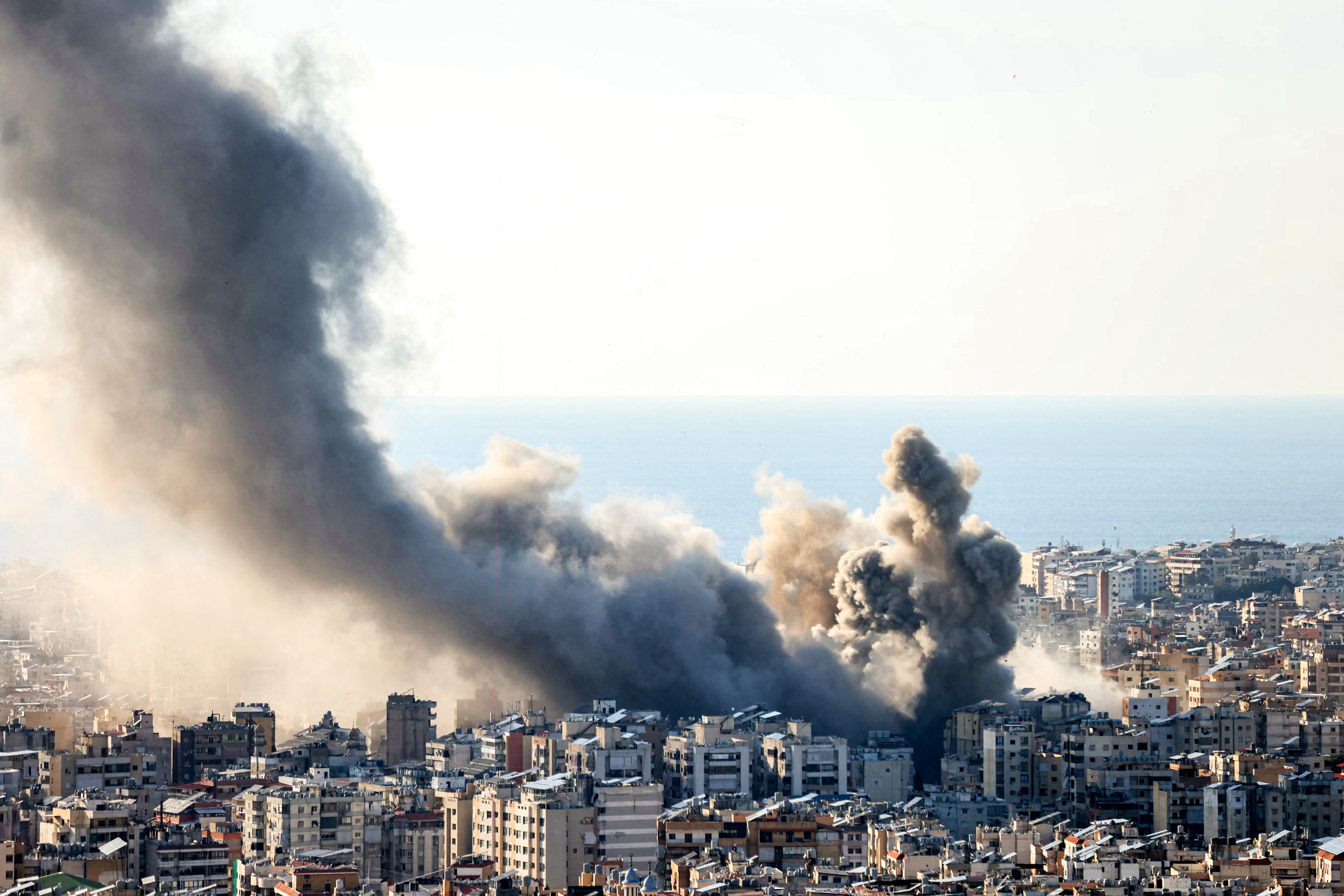 Smoke plumes billow following Israeli bombardment on Beirut's southern suburbs on March 2, 2026.