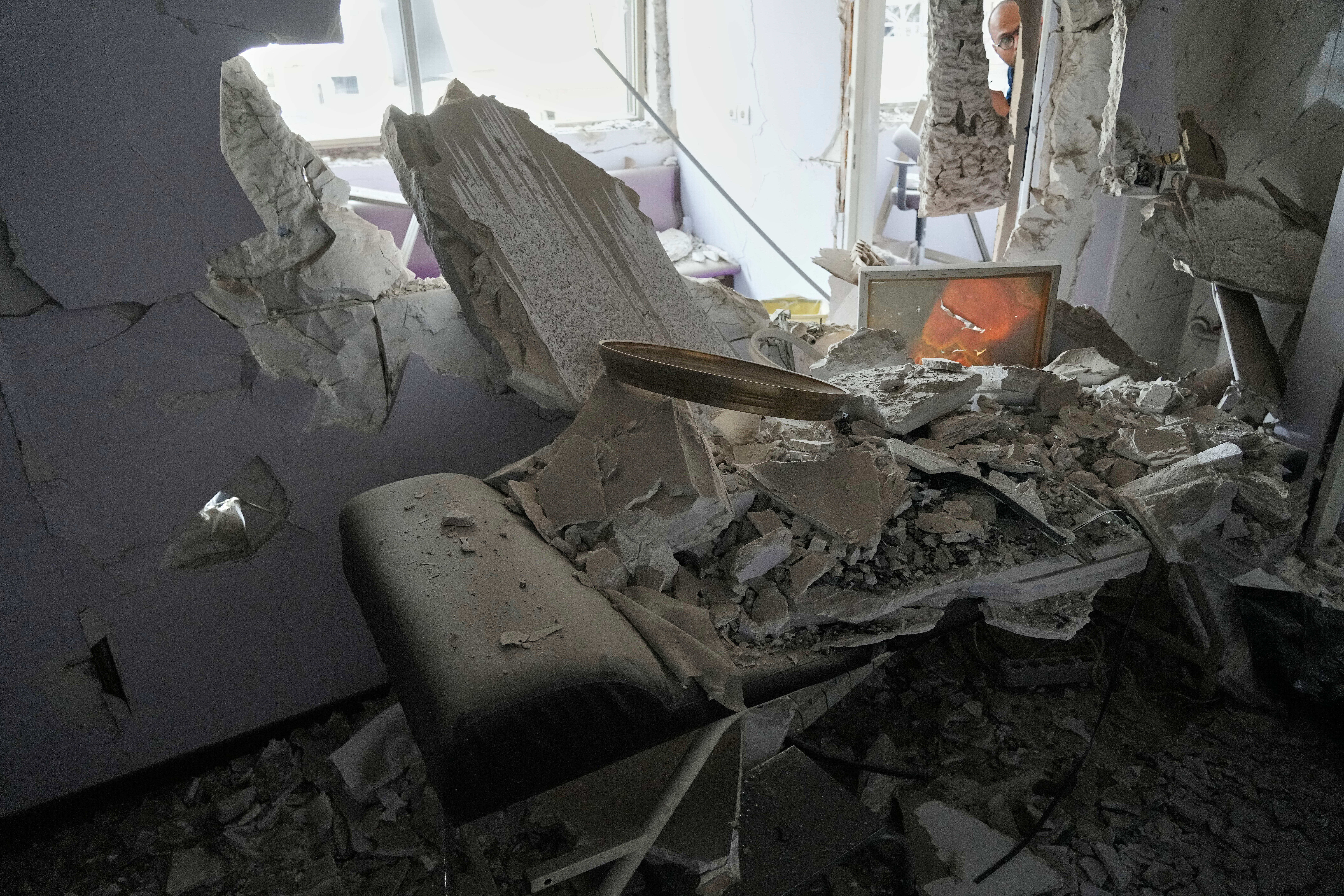 Debris is seen in a room of Gandhi Hospital, which was damaged when a strike hit a state TV communications tower and nearby buildings across the street during the ongoing joint U.S.-Israeli military campaign in Tehran, Iran, Monday, March 2, 2026.