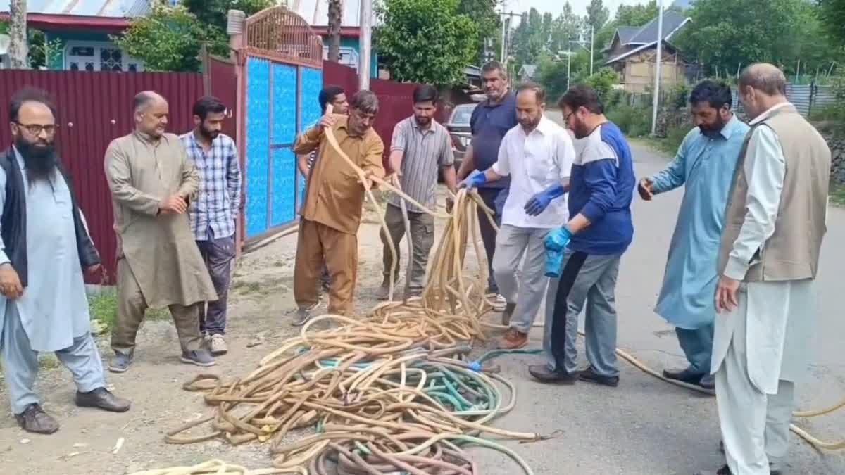 Jal shakti department seized Pipes used illegally for watering Kitchen garden in tral JK Urdu News
