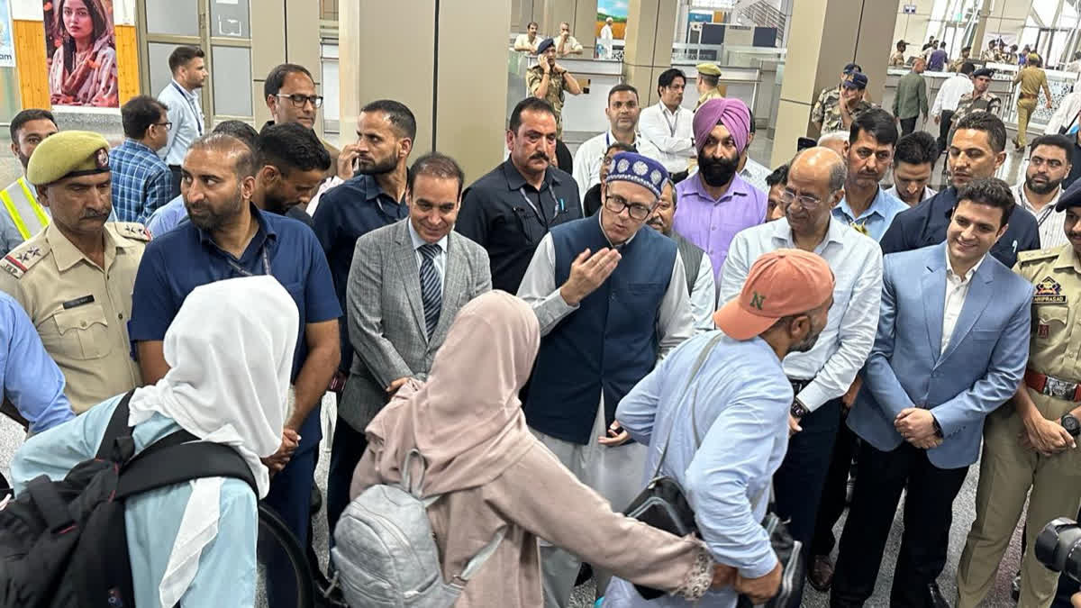 Jammu Kashmir CM Omar Abdullah greets pilgrims on their return from Hajj 2026, at Srinagar airport