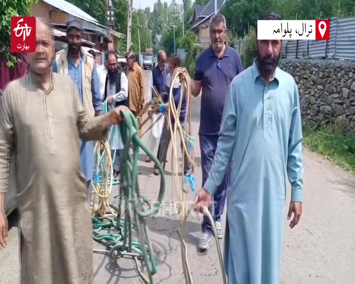 Jal shakti department seized Pipes used illegally for watering Kitchen garden in tral JK Urdu News
