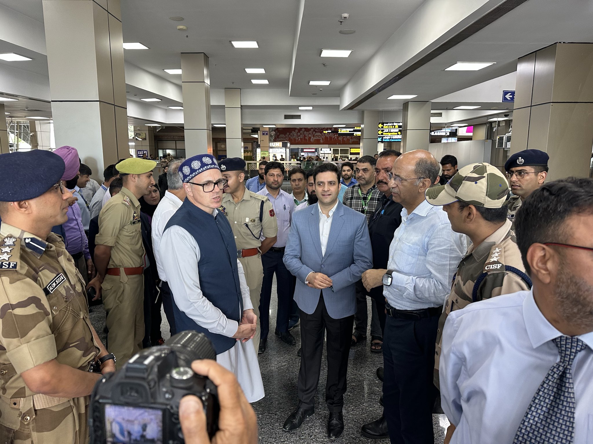 Jammu Kashmir CM Omar Abdullah greets pilgrims on their return from Hajj 2026, at Srinagar airport