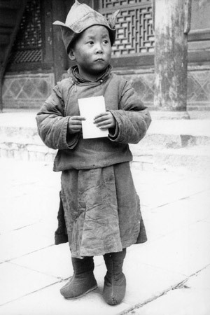 The Dalai Lama at the age of four at Kumbum Monastery in Amdo, Eastern Tibet.