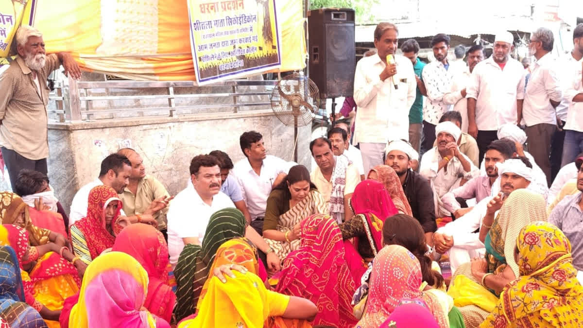 Victims staging a sit-in protest