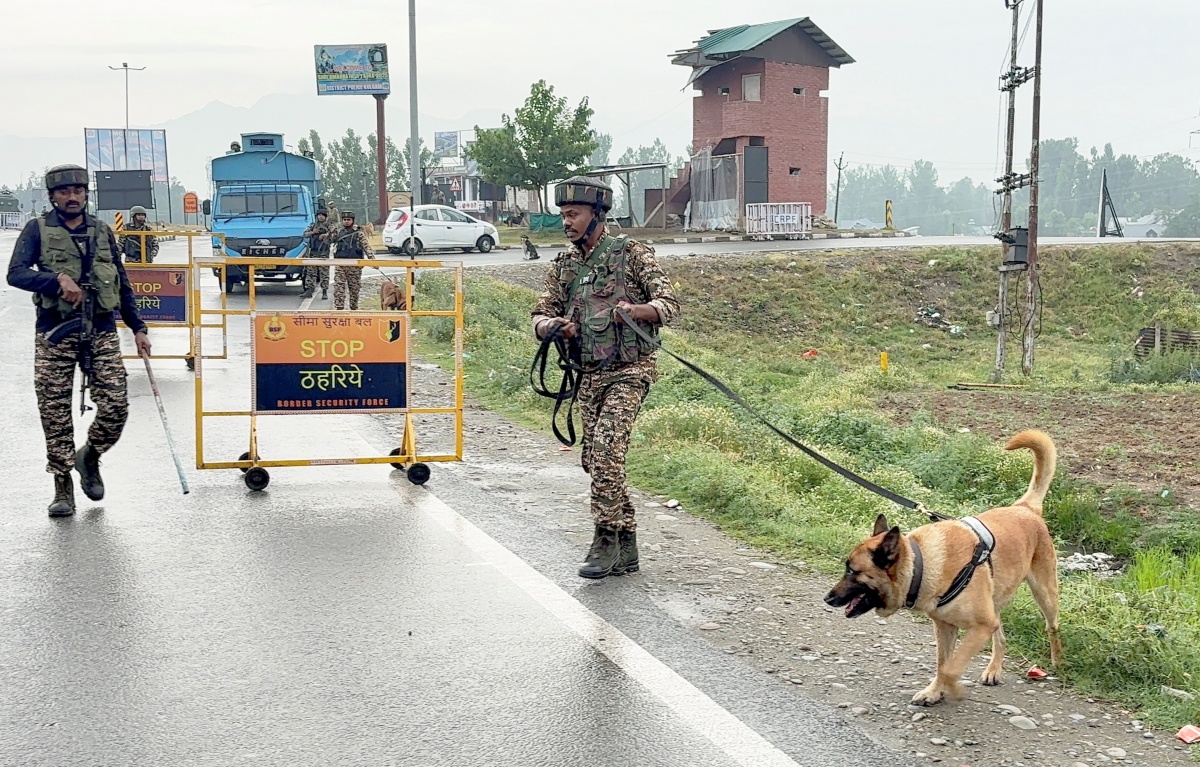 Security personnel carry out sanitisation operations with sniffer dogs along the Jammu-Srinagar Highway during the commencement of 2026 Amarnath Yatra, in Anantnag district, on Thursday, July 2, 2026.