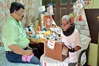 Dr Kaligopal Mukherjee at his clinic