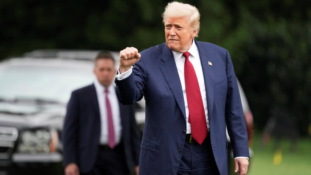 President Donald Trump gestures as he departs from the South Lawn of the White House en route to Joint Base Andrews, Md., Friday, Aug. 1, 2025, in Washington