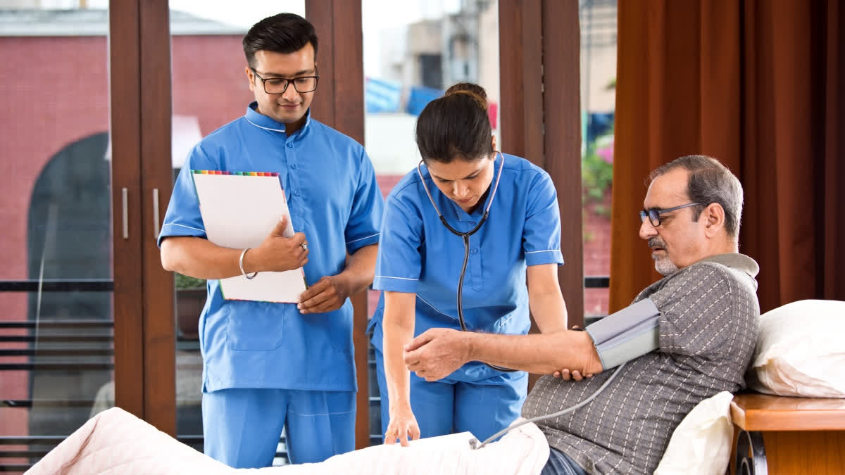 Patient with nurses