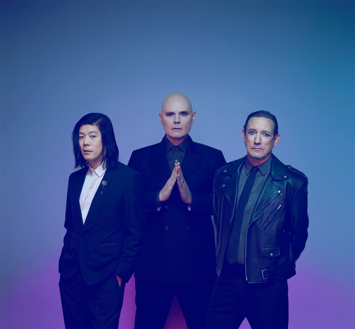 L-R: Guitartist James Iha, frontman and guitarist Billy Corgan, and drummer Jimmy Chamberlin
