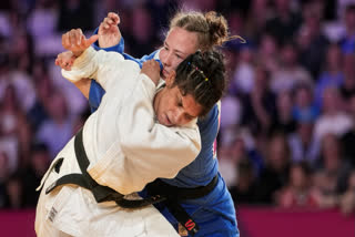 India's Unnati Sharma, in white, competes against Australia's Saya Middleton during a women's 63kg semifinal Judo match at the 23rd Commonwealth Games (CWG), in Glasgow, Scotland, Saturday, Aug. 1, 2026.