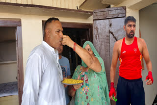 Celebrations in Hansi after boxer Narendra Berwal wins a silver medal at the Commonwealth Games 2026