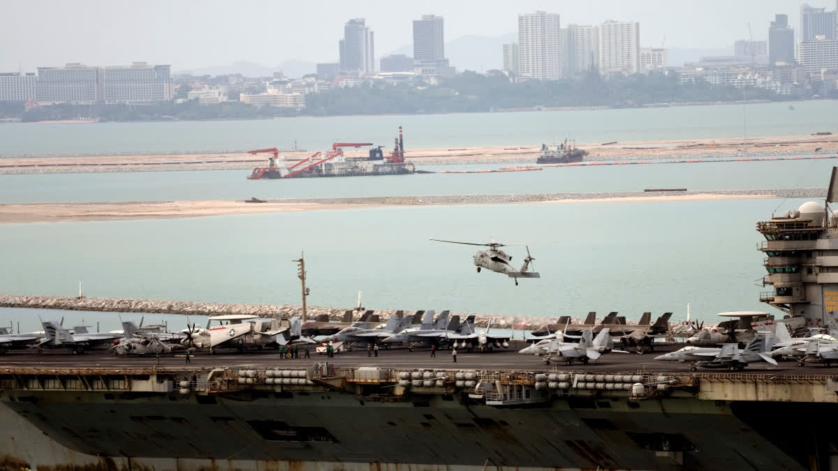 A helicopter lands on the U.S. Navy aircraft carrier USS Abraham Lincoln after it arrived at the port in Laem Chabang, Chonburi, Thailand, Wednesday, Sept. 2, 2026.
