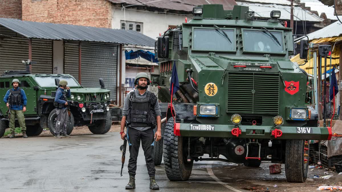 Security deployment during an anti-terror operation in Kashmir.