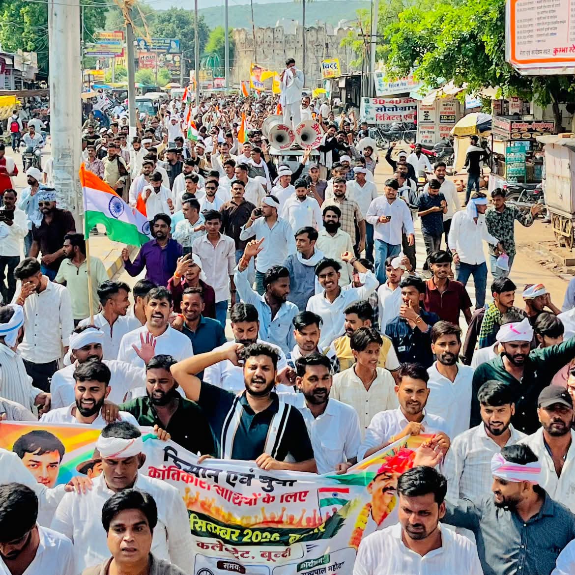 Supporters marching towards the Collectorate in procession