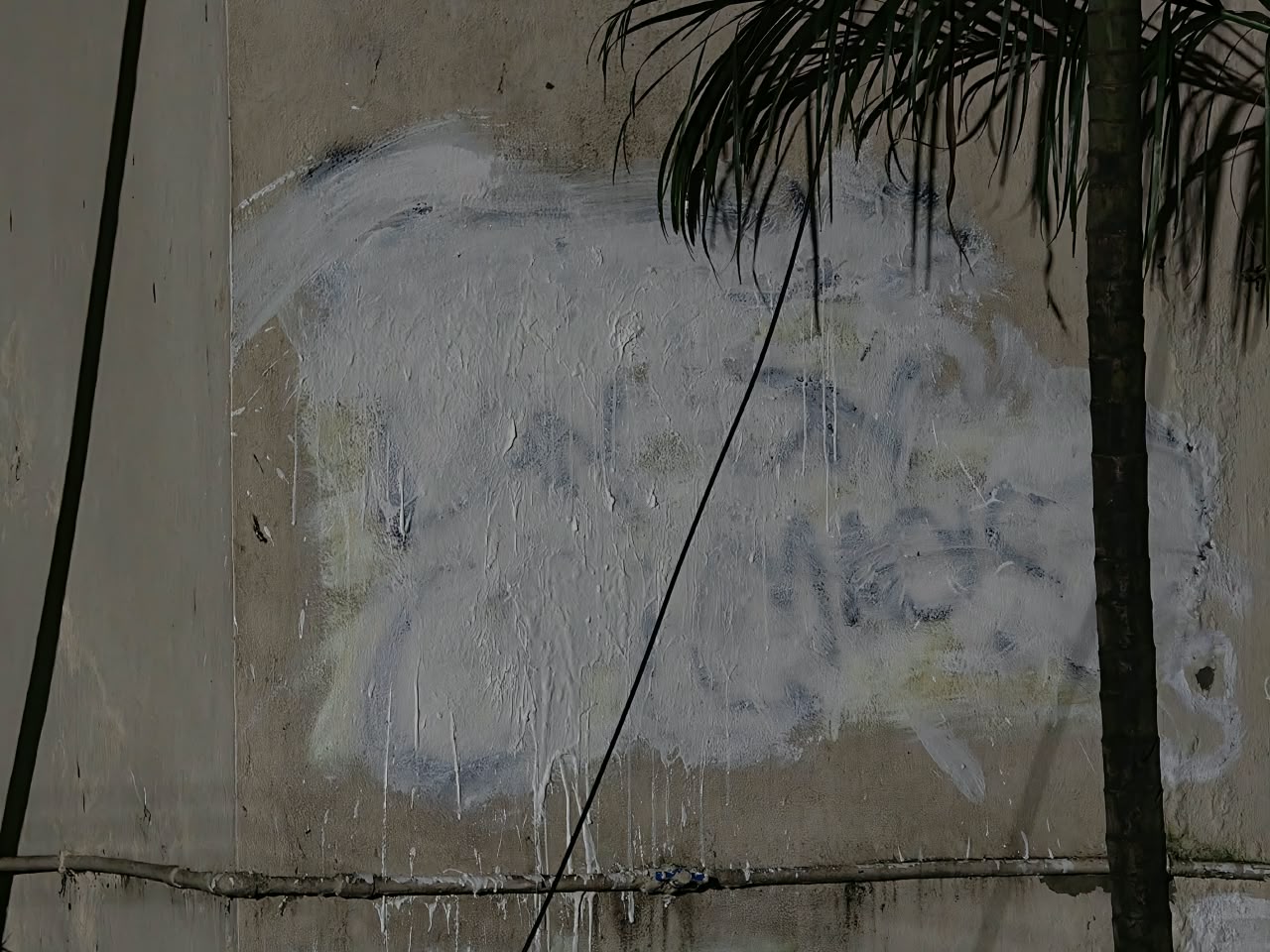 A fresh coat of paint on a graffiti at Jadavpur University.