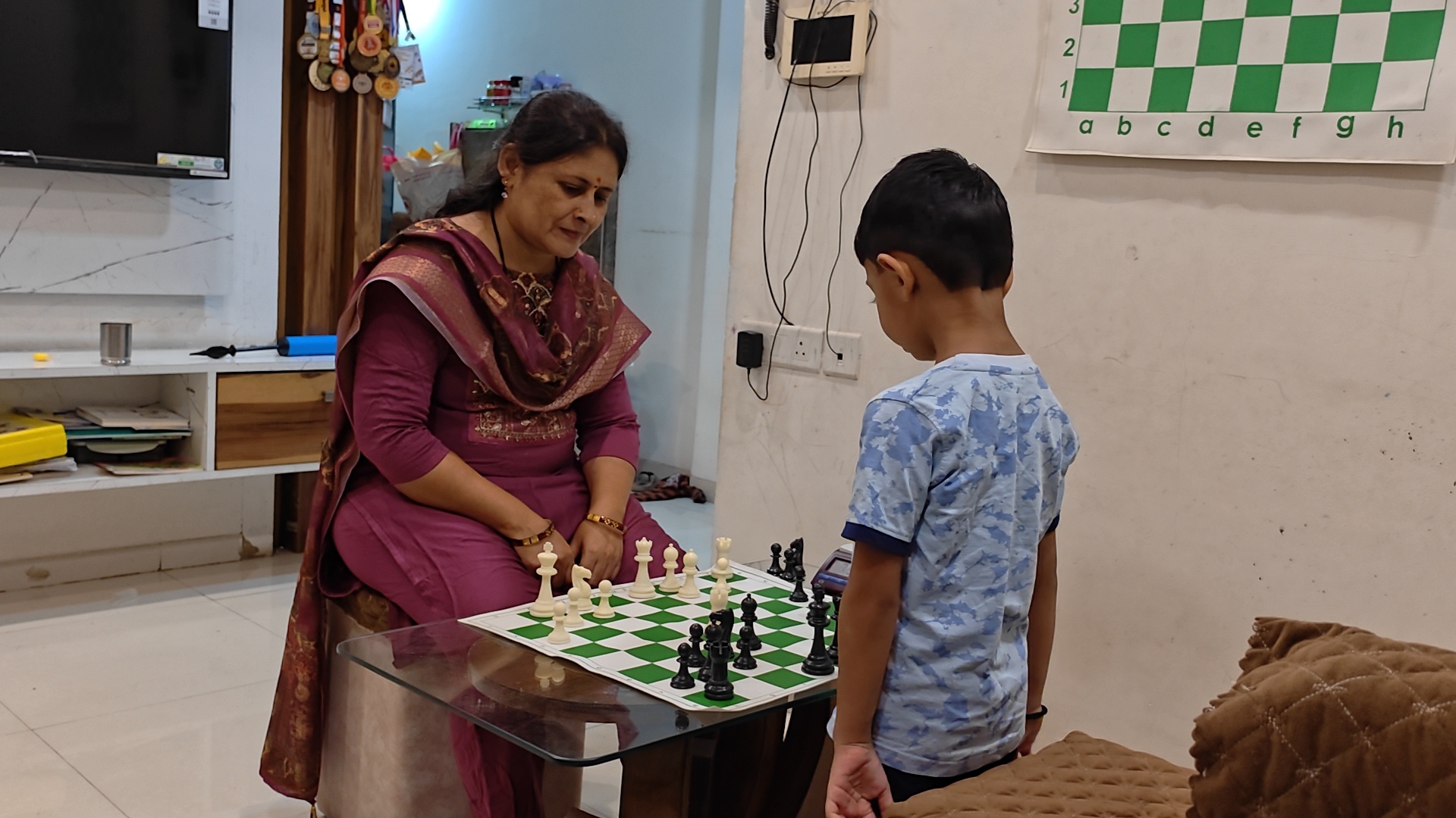 Women Become Chess Arbiter For Son