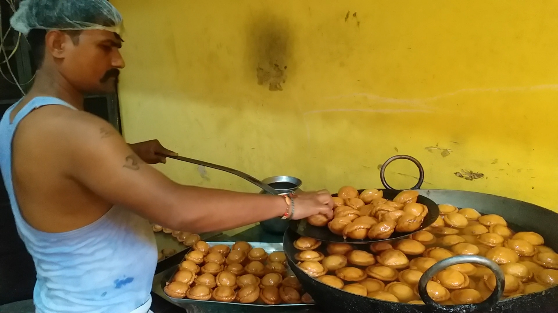 An artisan prepares 'Chandrakala' sweet in Barabanki, Uttar Pradesh
