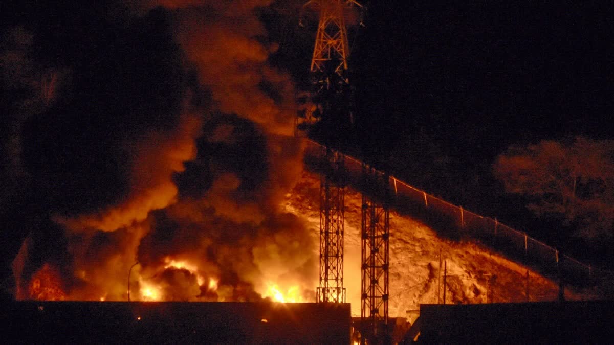 Picture of fire at Fuerte Tiuna, Venezuela's largest military complex, after a series of explosions in Caracas on January 3, 2026