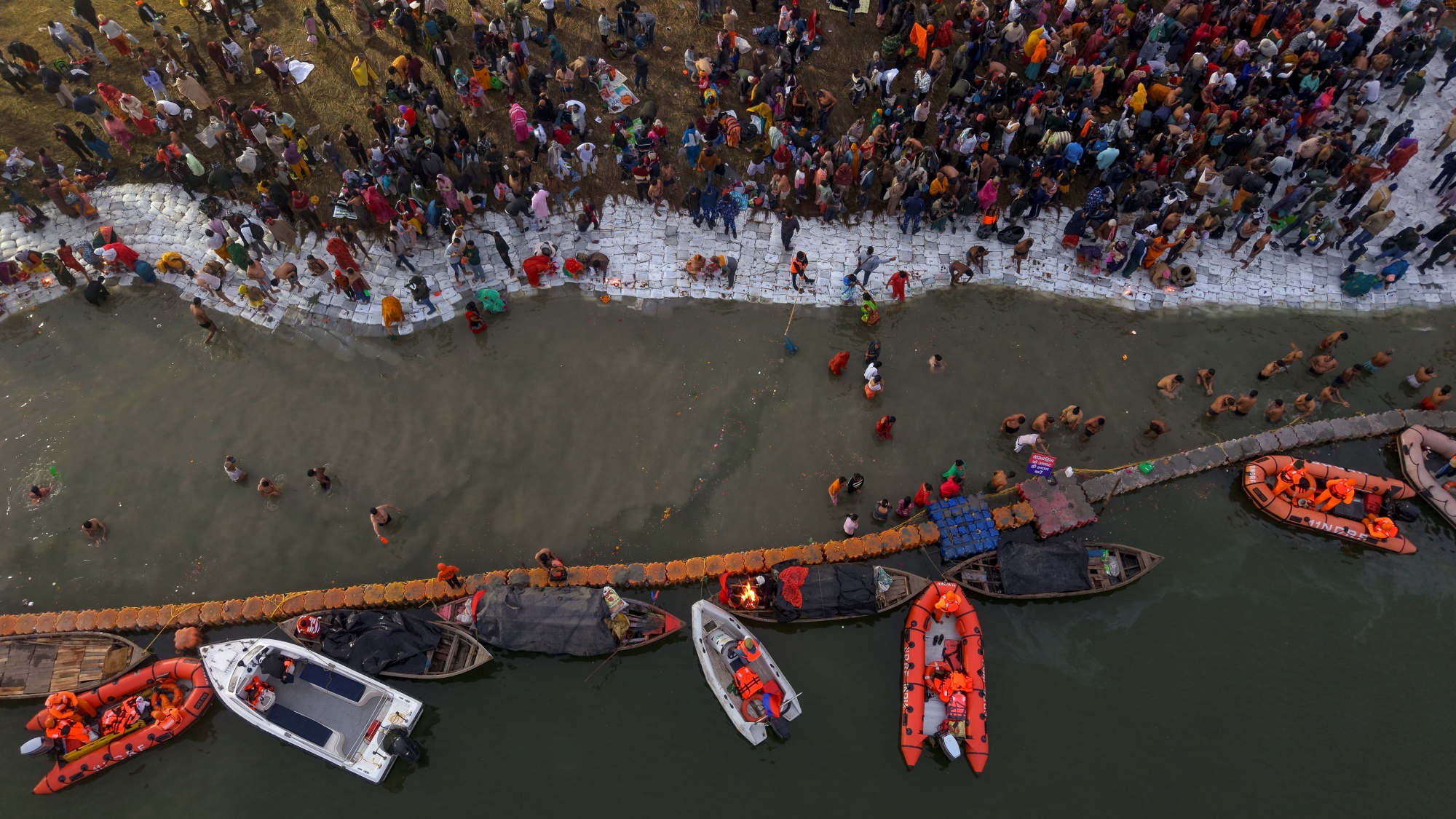 Lakhs Of Devotees Take Holy Dip At Sangam On First Day Of Magh Mela