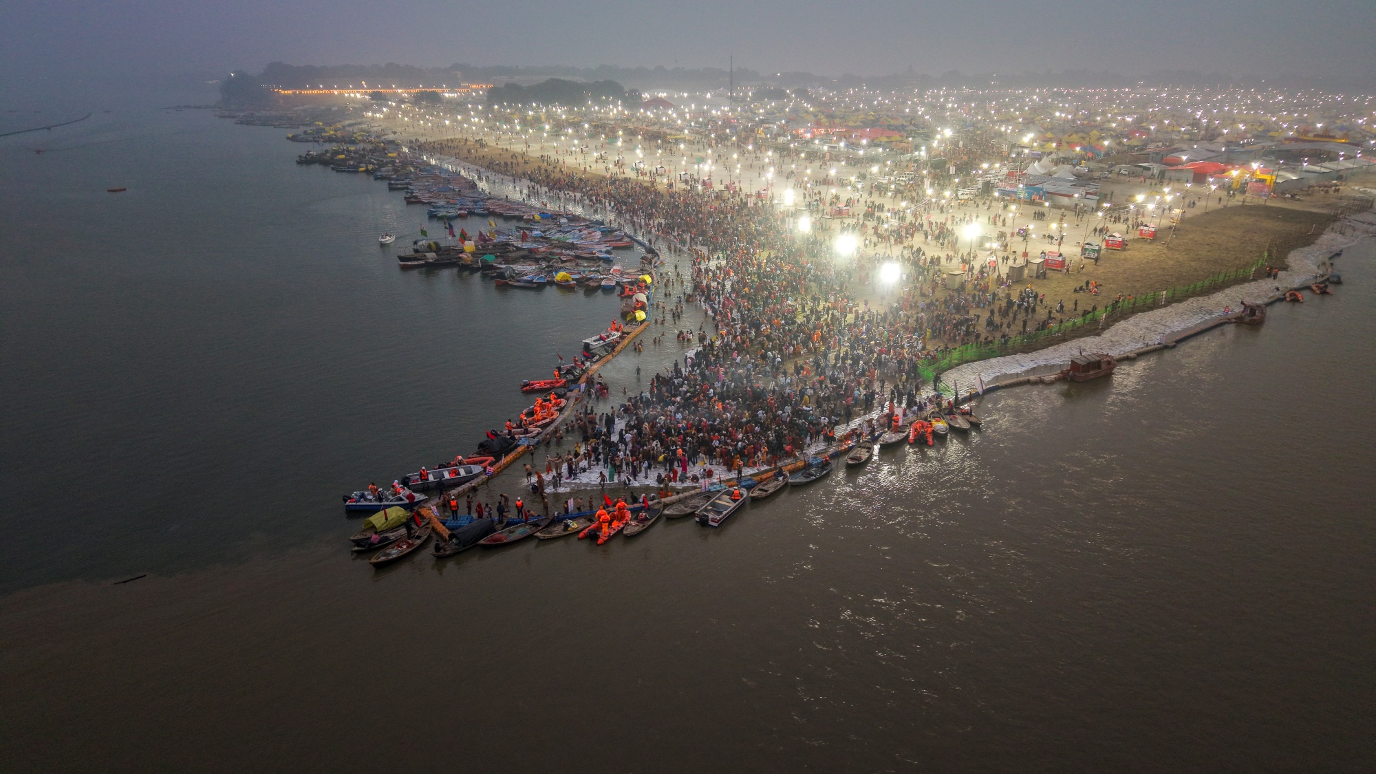 Lakhs Of Devotees Take Holy Dip At Sangam On First Day Of Magh Mela
