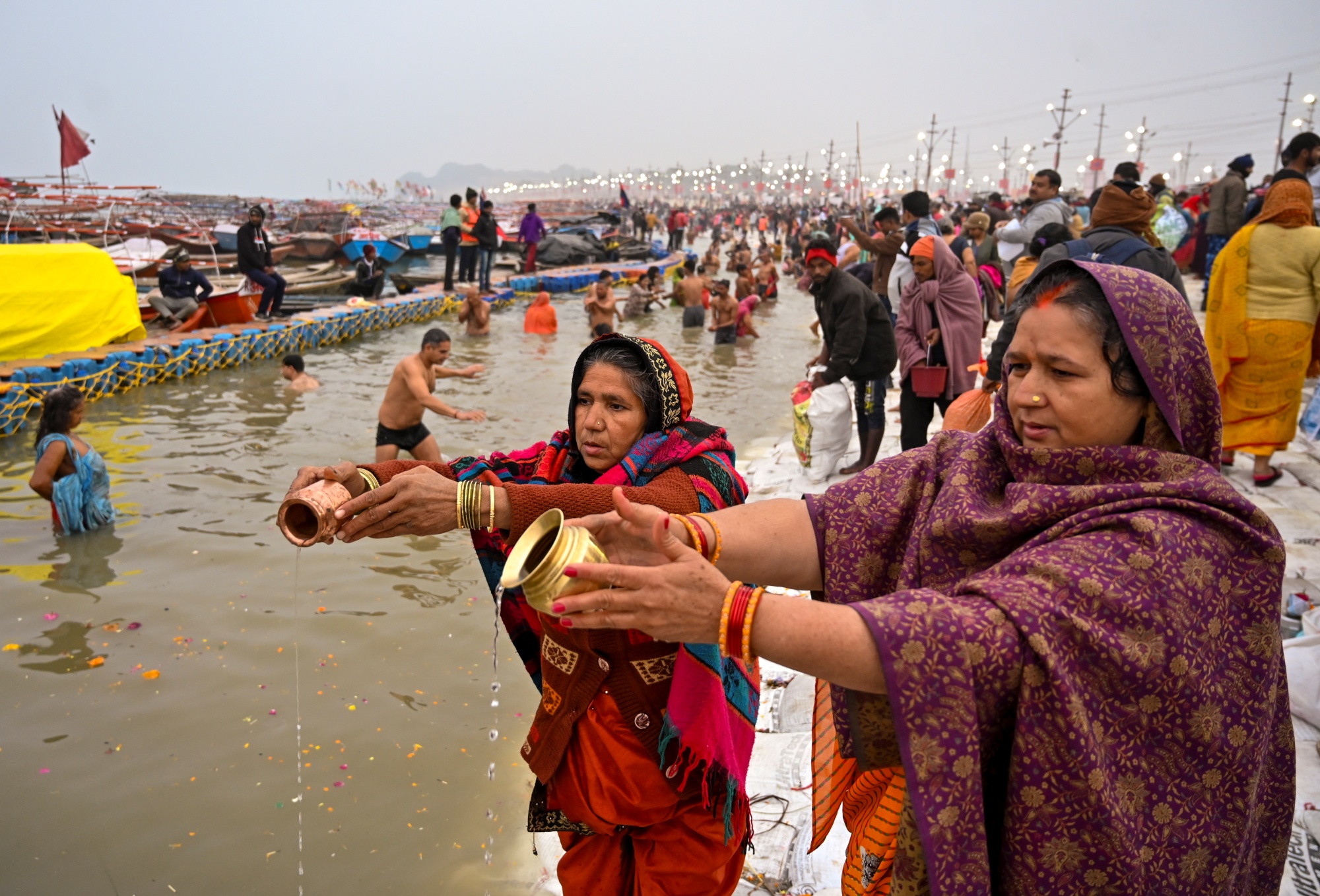 Lakhs Of Devotees Take Holy Dip At Sangam On First Day Of Magh Mela