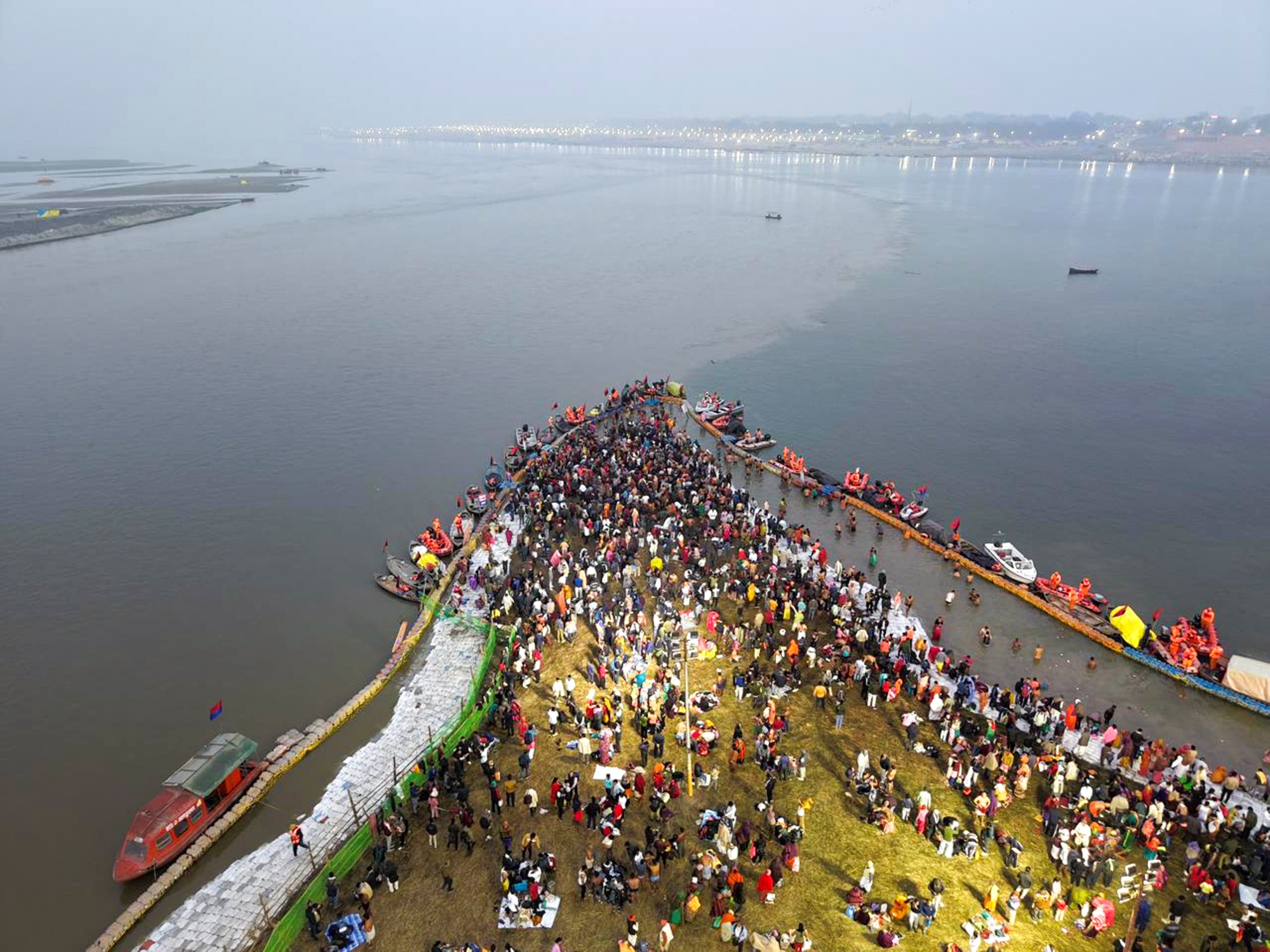 Lakhs Of Devotees Take Holy Dip At Sangam On First Day Of Magh Mela