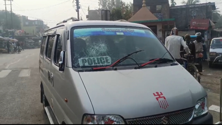 The police vehicle damaged in the attack.