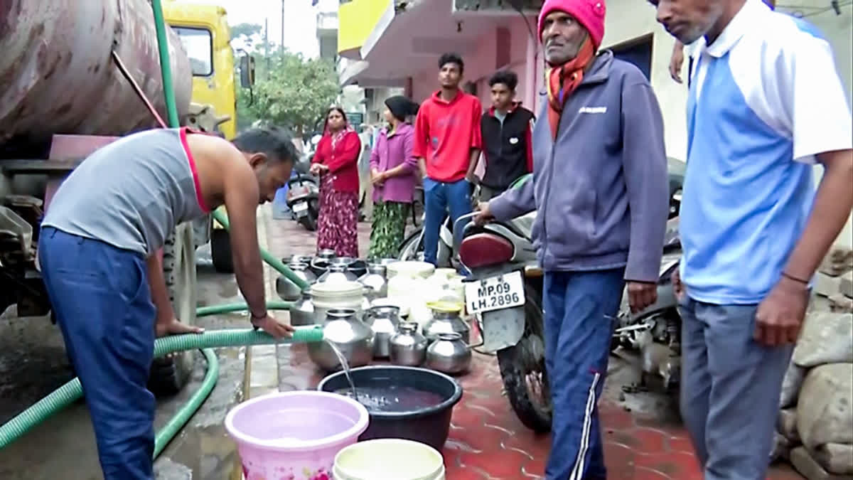 Indore Water Contamination: Judicial Panel Extends Deadline For Submitting Evidence To Apr 1 FILE- People fill buckets with water from a water tanker as the Eight dead and more than 200 hospitalised due to water contamination, in Indore.