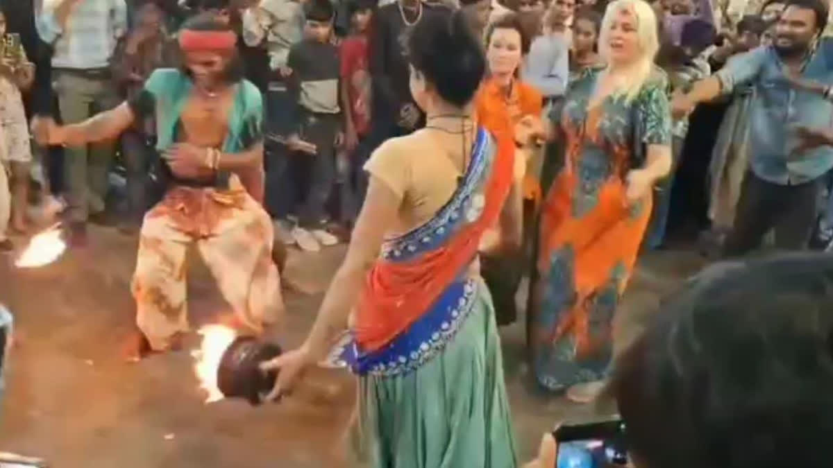 Israeli and Indian tourists celebrate Holi together in Pushkar.