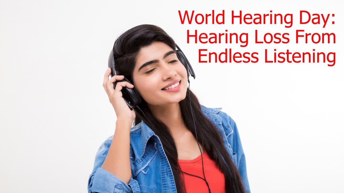 Young girl listening to music on headphones