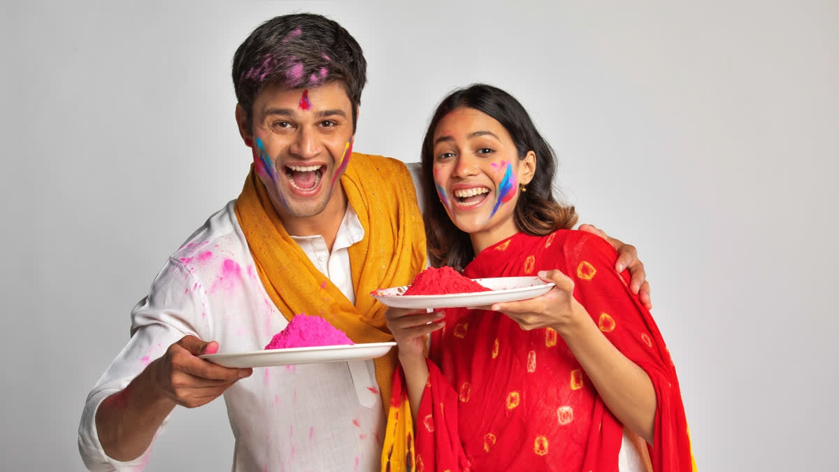 Couple celebrating Holi