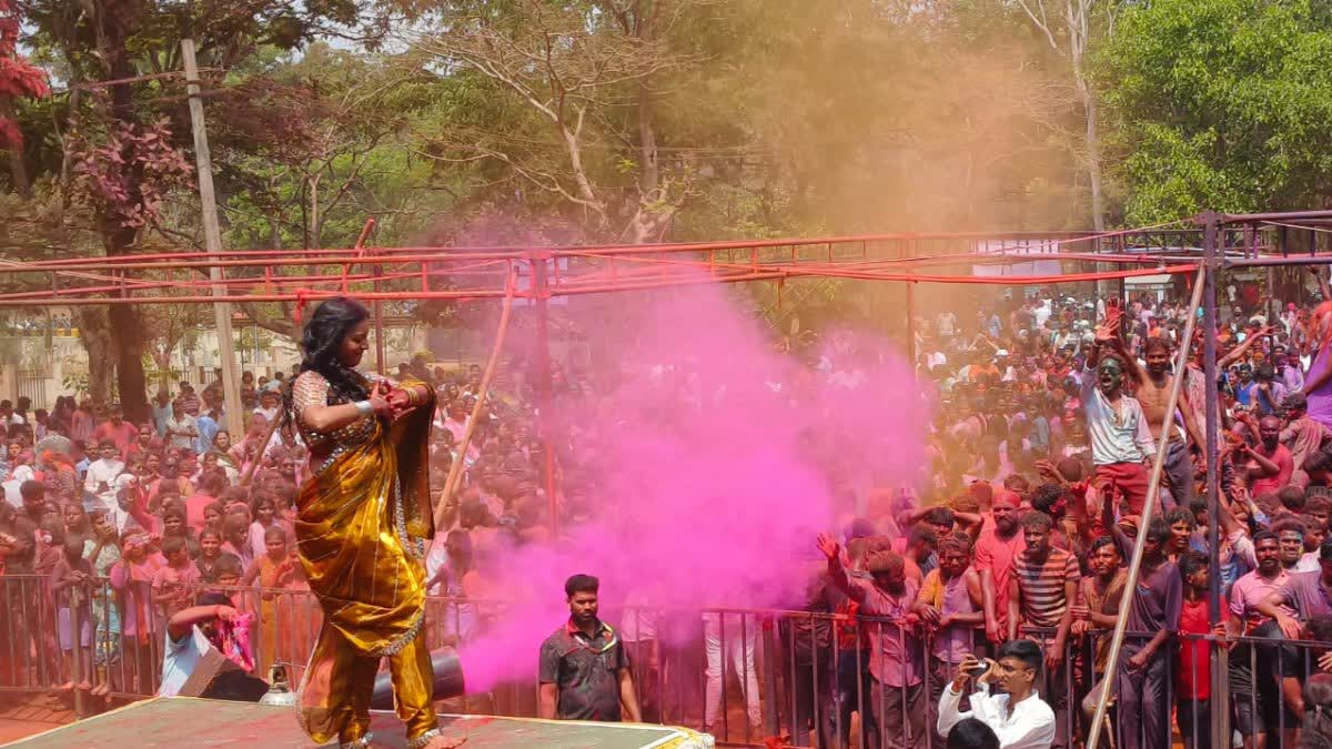 Holi Celebration In Belagavi: Young men and women dancing and having fun