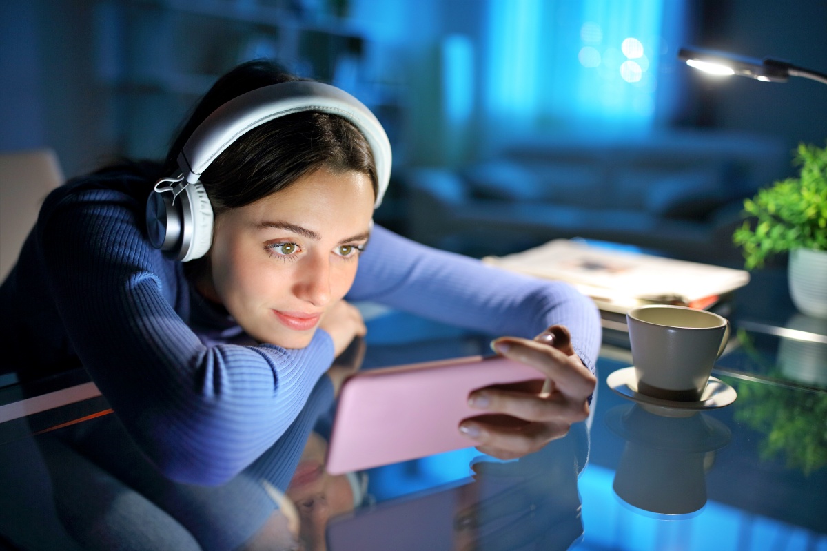 Girl watching a show on her mobile