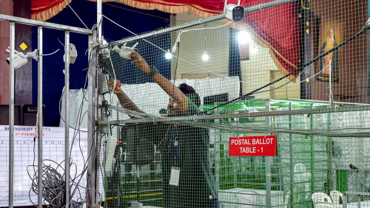 An official sets up a CCTV camera at a counting centre ahead of the result declaration of the Kerala Assembly elections, in Thiruvananthapuram, Saturday, May 2, 2026.
